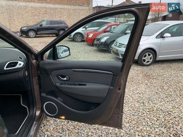 Коричневий Рено Гранд Сценік, об'ємом двигуна 1.87 л та пробігом 332 тис. км за 7499 $, фото 12 на Automoto.ua