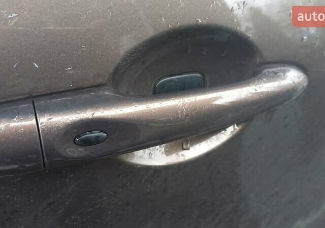 Коричневый Рено Гранд Сценик, объемом двигателя 1.5 л и пробегом 200 тыс. км за 8990 $, фото 4 на Automoto.ua