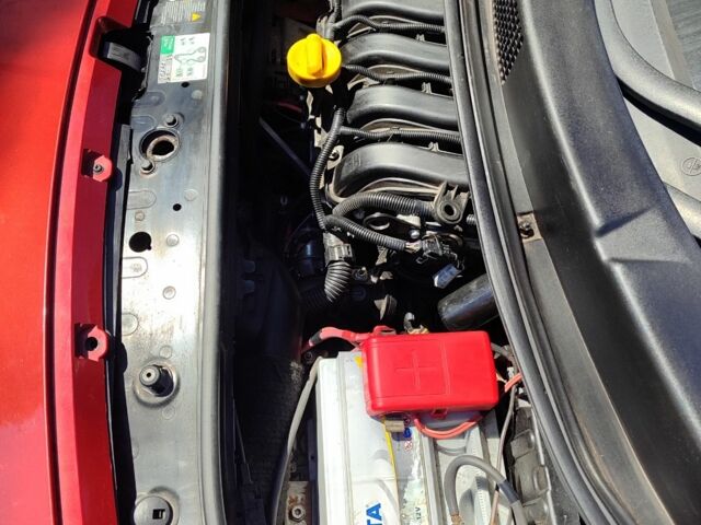 Красный Рено Гранд Сценик, объемом двигателя 1.6 л и пробегом 176 тыс. км за 5000 $, фото 3 на Automoto.ua