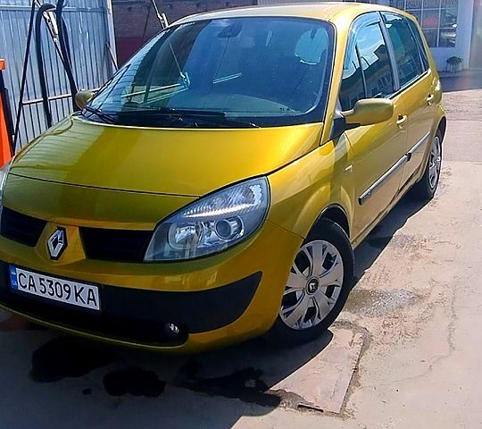 Желтый Рено Гранд Сценик, объемом двигателя 1.9 л и пробегом 226 тыс. км за 6000 $, фото 1 на Automoto.ua