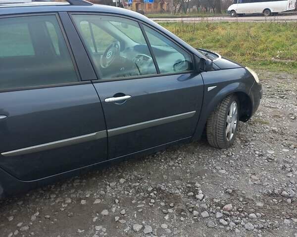 Серый Рено Гранд Сценик, объемом двигателя 2 л и пробегом 215 тыс. км за 4900 $, фото 4 на Automoto.ua