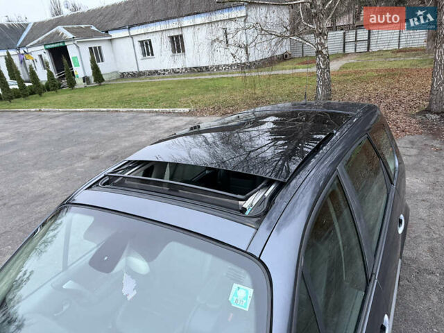 Серый Рено Гранд Сценик, объемом двигателя 2 л и пробегом 140 тыс. км за 5750 $, фото 3 на Automoto.ua