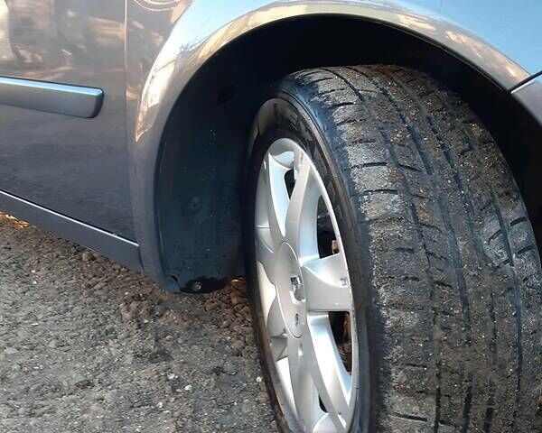 Серый Рено Гранд Сценик, объемом двигателя 1.5 л и пробегом 216 тыс. км за 6600 $, фото 40 на Automoto.ua