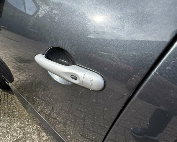 Рено Гранд Сценик 2009 в Луцке на Automoto.ua Серый Рено Гранд Сценик, объемом двигателя 1.4 л и пробегом 205 тыс. км за 5300 $, фото 5 на Automoto.ua