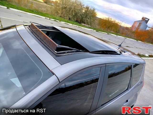 Рено Гранд Сценик 2009 в Николаеве на Automoto.ua Серый Рено Гранд Сценик, объемом двигателя 1.4 л и пробегом 238 тыс. км за 8500 $, фото 4 на Automoto.ua