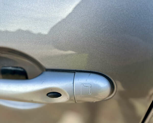 Серый Рено Гранд Сценик, объемом двигателя 1.5 л и пробегом 245 тыс. км за 6299 $, фото 14 на Automoto.ua