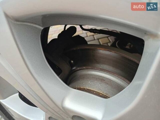 Серый Рено Гранд Сценик, объемом двигателя 1.5 л и пробегом 188 тыс. км за 8300 $, фото 68 на Automoto.ua
