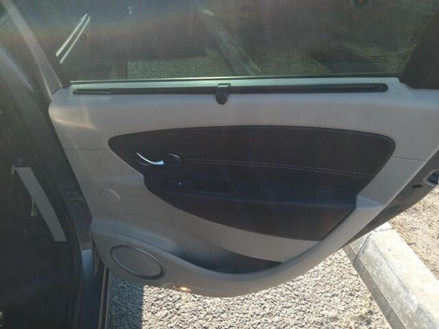 Серый Рено Гранд Сценик, объемом двигателя 1.5 л и пробегом 309 тыс. км за 8750 $, фото 6 на Automoto.ua