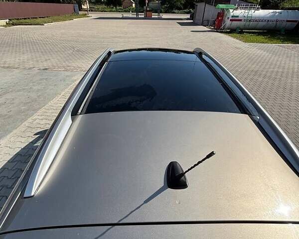 Серый Рено Гранд Сценик, объемом двигателя 1.5 л и пробегом 255 тыс. км за 11000 $, фото 1 на Automoto.ua