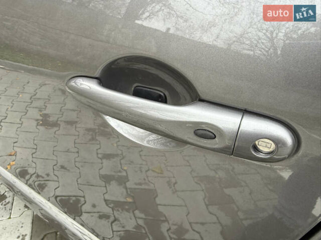 Сірий Рено Гранд Сценік, об'ємом двигуна 1.6 л та пробігом 234 тис. км за 10800 $, фото 84 на Automoto.ua