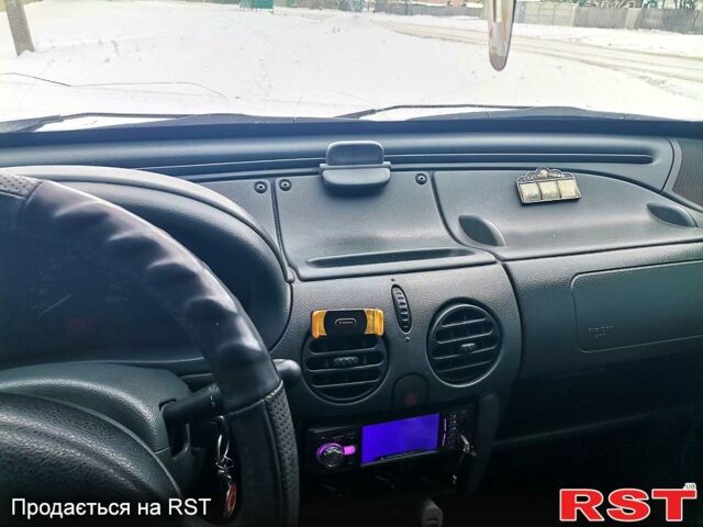 Белый Рено Кенгу, объемом двигателя 1.2 л и пробегом 330 тыс. км за 2300 $, фото 6 на Automoto.ua