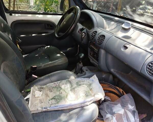 Білий Рено Кєнгу, об'ємом двигуна 1.2 л та пробігом 220 тис. км за 1500 $, фото 5 на Automoto.ua