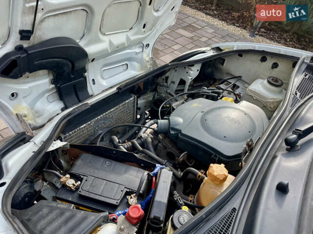 Білий Рено Кєнгу, об'ємом двигуна 1.4 л та пробігом 300 тис. км за 2850 $, фото 30 на Automoto.ua