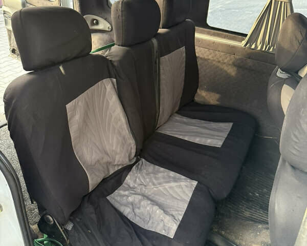 Белый Рено Кенгу, объемом двигателя 1.46 л и пробегом 414 тыс. км за 2600 $, фото 9 на Automoto.ua