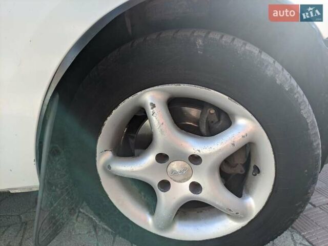 Белый Рено Кенгу, объемом двигателя 1.5 л и пробегом 294 тыс. км за 2800 $, фото 10 на Automoto.ua