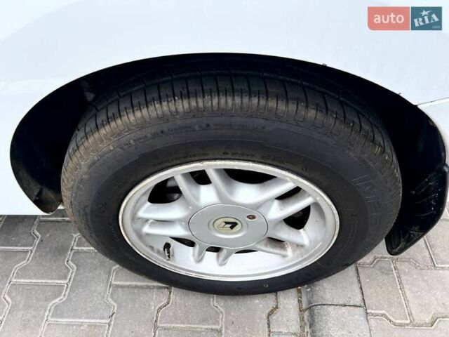 Білий Рено Кєнгу, об'ємом двигуна 1.46 л та пробігом 181 тис. км за 7199 $, фото 12 на Automoto.ua