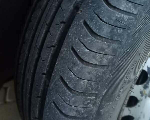 Рено Кенгу 2011 в Хмельницком на Automoto.ua Белый Рено Кенгу, объемом двигателя 1.5 л и пробегом 175 тыс. км за 6000 $, фото 14 на Automoto.ua