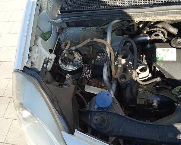 Белый Рено Кенгу, объемом двигателя 1.46 л и пробегом 279 тыс. км за 7500 $, фото 1 на Automoto.ua