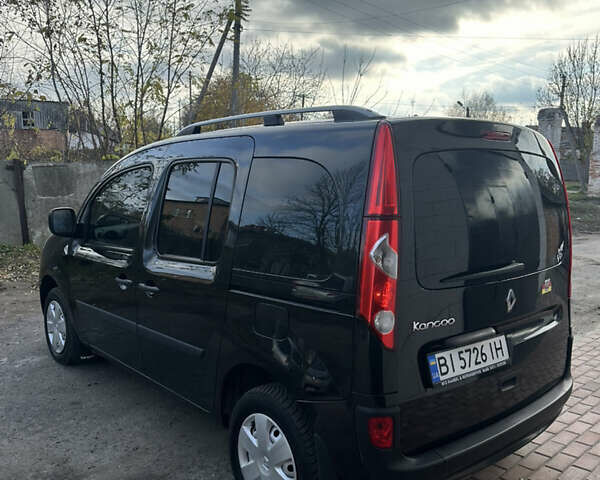 Черный Рено Кенгу, объемом двигателя 1.6 л и пробегом 190 тыс. км за 7199 $, фото 5 на Automoto.ua