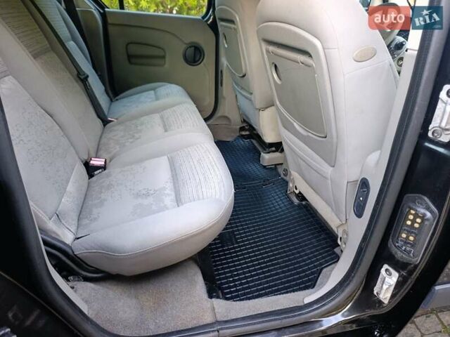 Чорний Рено Кєнгу, об'ємом двигуна 1.6 л та пробігом 245 тис. км за 7500 $, фото 23 на Automoto.ua