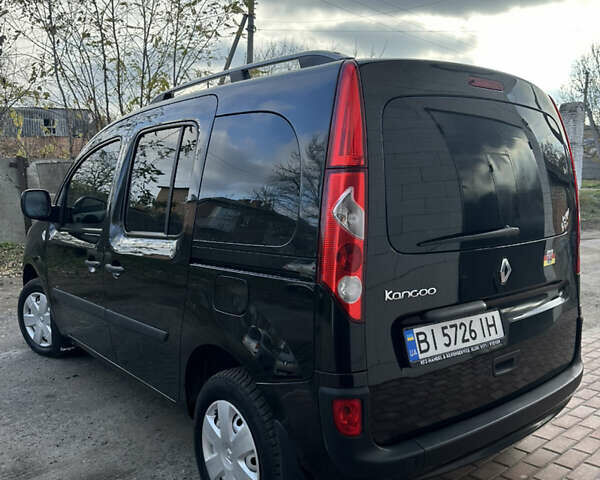 Черный Рено Кенгу, объемом двигателя 1.6 л и пробегом 190 тыс. км за 7199 $, фото 37 на Automoto.ua