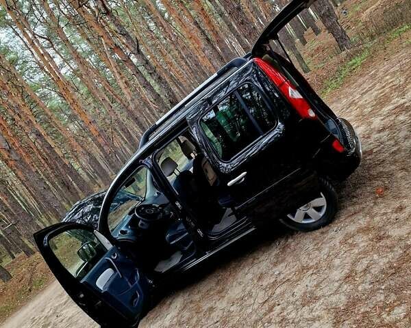 Черный Рено Кенгу, объемом двигателя 1.6 л и пробегом 229 тыс. км за 7900 $, фото 131 на Automoto.ua