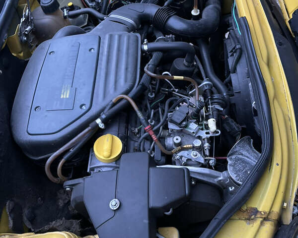 Желтый Рено Кенгу, объемом двигателя 1.87 л и пробегом 358 тыс. км за 3000 $, фото 1 на Automoto.ua