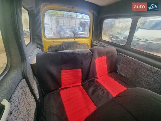 Желтый Рено Кенгу, объемом двигателя 1.87 л и пробегом 305 тыс. км за 2150 $, фото 10 на Automoto.ua
