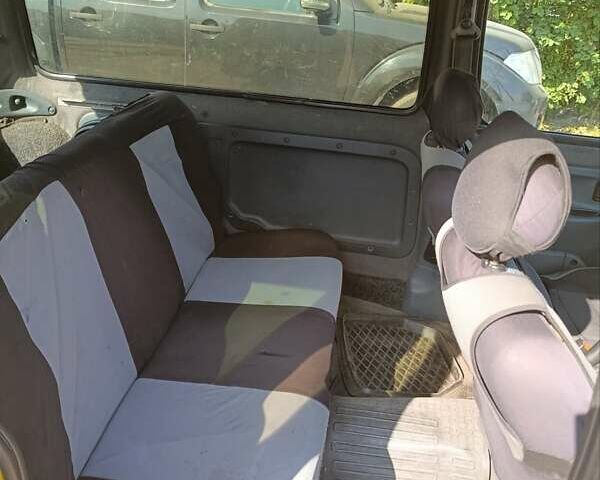 Желтый Рено Кенгу, объемом двигателя 1.5 л и пробегом 348 тыс. км за 2500 $, фото 7 на Automoto.ua