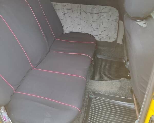 Желтый Рено Кенгу, объемом двигателя 1.46 л и пробегом 306 тыс. км за 3200 $, фото 2 на Automoto.ua