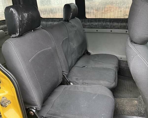 Желтый Рено Кенгу, объемом двигателя 1.5 л и пробегом 450 тыс. км за 3200 $, фото 18 на Automoto.ua