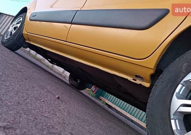 Желтый Рено Кенгу, объемом двигателя 1.5 л и пробегом 173 тыс. км за 3450 $, фото 22 на Automoto.ua