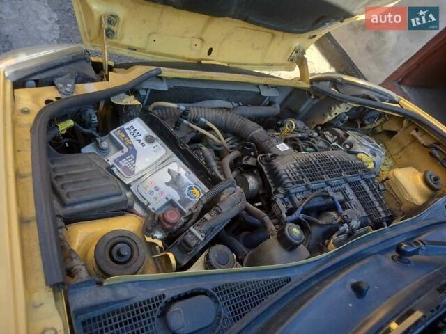Желтый Рено Кенгу, объемом двигателя 1.46 л и пробегом 268 тыс. км за 4100 $, фото 11 на Automoto.ua