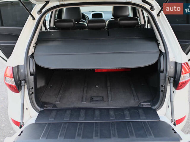 Белый Рено Колеос, объемом двигателя 2 л и пробегом 202 тыс. км за 10300 $, фото 52 на Automoto.ua