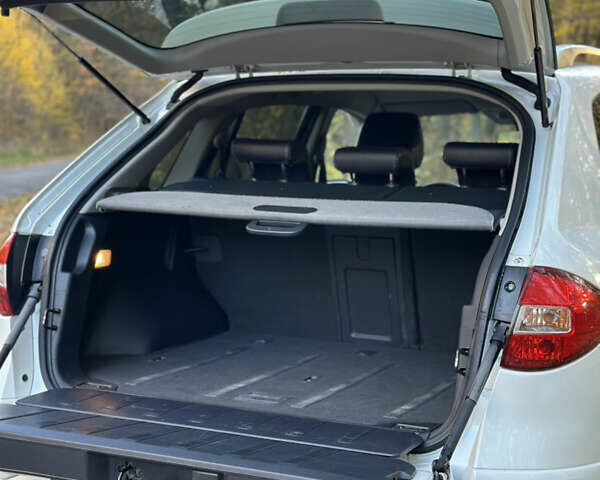 Білий Рено Колеос, об'ємом двигуна 2 л та пробігом 231 тис. км за 10600 $, фото 8 на Automoto.ua