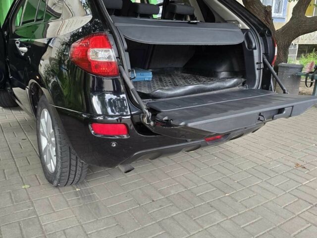 Черный Рено Колеос, объемом двигателя 2.5 л и пробегом 173 тыс. км за 8650 $, фото 6 на Automoto.ua