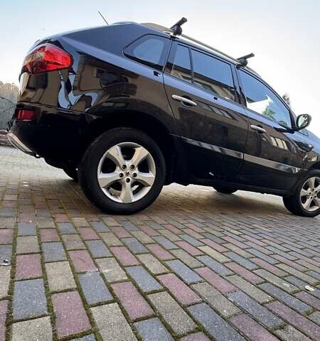 Черный Рено Колеос, объемом двигателя 2 л и пробегом 284 тыс. км за 7500 $, фото 1 на Automoto.ua