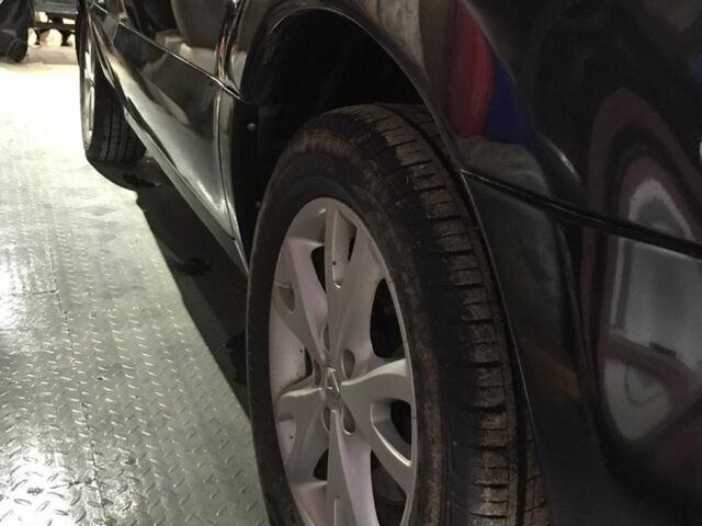 Черный Рено Колеос, объемом двигателя 2 л и пробегом 2 тыс. км за 7700 $, фото 1 на Automoto.ua