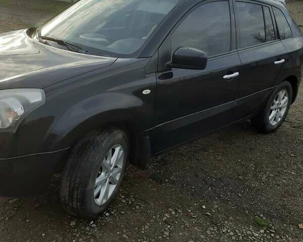 Черный Рено Колеос, объемом двигателя 2.49 л и пробегом 155 тыс. км за 9500 $, фото 2 на Automoto.ua