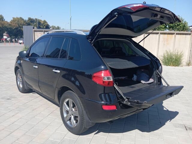 Черный Рено Колеос, объемом двигателя 2.5 л и пробегом 235 тыс. км за 7400 $, фото 2 на Automoto.ua