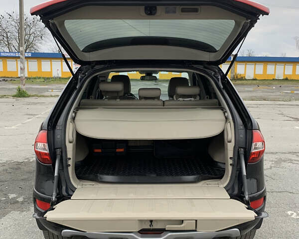 Черный Рено Колеос, объемом двигателя 2 л и пробегом 288 тыс. км за 11800 $, фото 11 на Automoto.ua