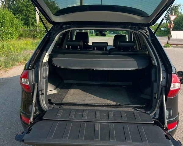 Черный Рено Колеос, объемом двигателя 2 л и пробегом 312 тыс. км за 10500 $, фото 2 на Automoto.ua