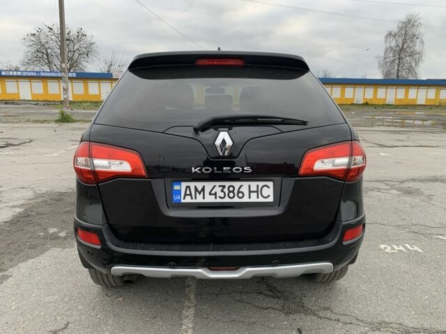 Черный Рено Колеос, объемом двигателя 2 л и пробегом 288 тыс. км за 11800 $, фото 3 на Automoto.ua