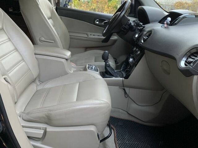 Черный Рено Колеос, объемом двигателя 2 л и пробегом 288 тыс. км за 11800 $, фото 13 на Automoto.ua