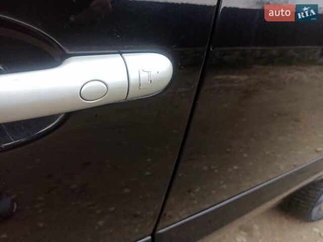 Черный Рено Колеос, объемом двигателя 2 л и пробегом 180 тыс. км за 12350 $, фото 27 на Automoto.ua