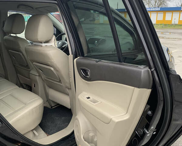 Черный Рено Колеос, объемом двигателя 2 л и пробегом 288 тыс. км за 11800 $, фото 8 на Automoto.ua