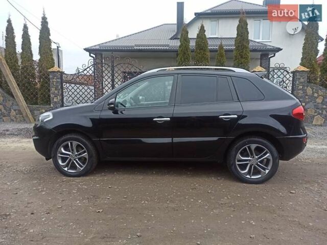 Черный Рено Колеос, объемом двигателя 2 л и пробегом 180 тыс. км за 12350 $, фото 3 на Automoto.ua