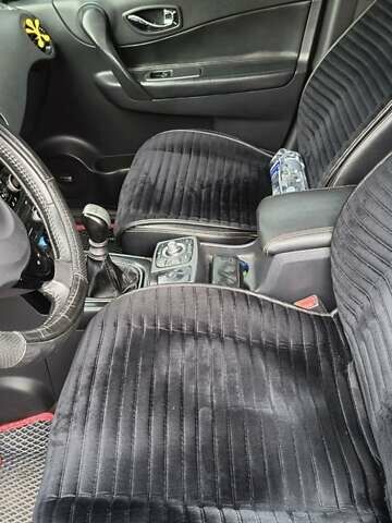 Черный Рено Колеос, объемом двигателя 2 л и пробегом 174 тыс. км за 13299 $, фото 18 на Automoto.ua