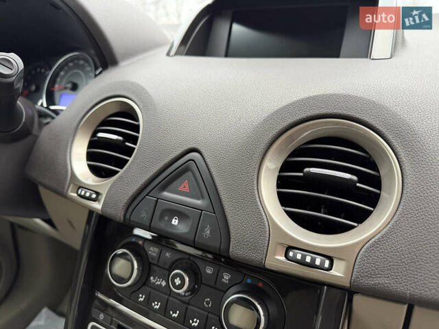 Черный Рено Колеос, объемом двигателя 2.5 л и пробегом 179 тыс. км за 14000 $, фото 48 на Automoto.ua