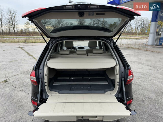 Черный Рено Колеос, объемом двигателя 2.5 л и пробегом 179 тыс. км за 14000 $, фото 57 на Automoto.ua